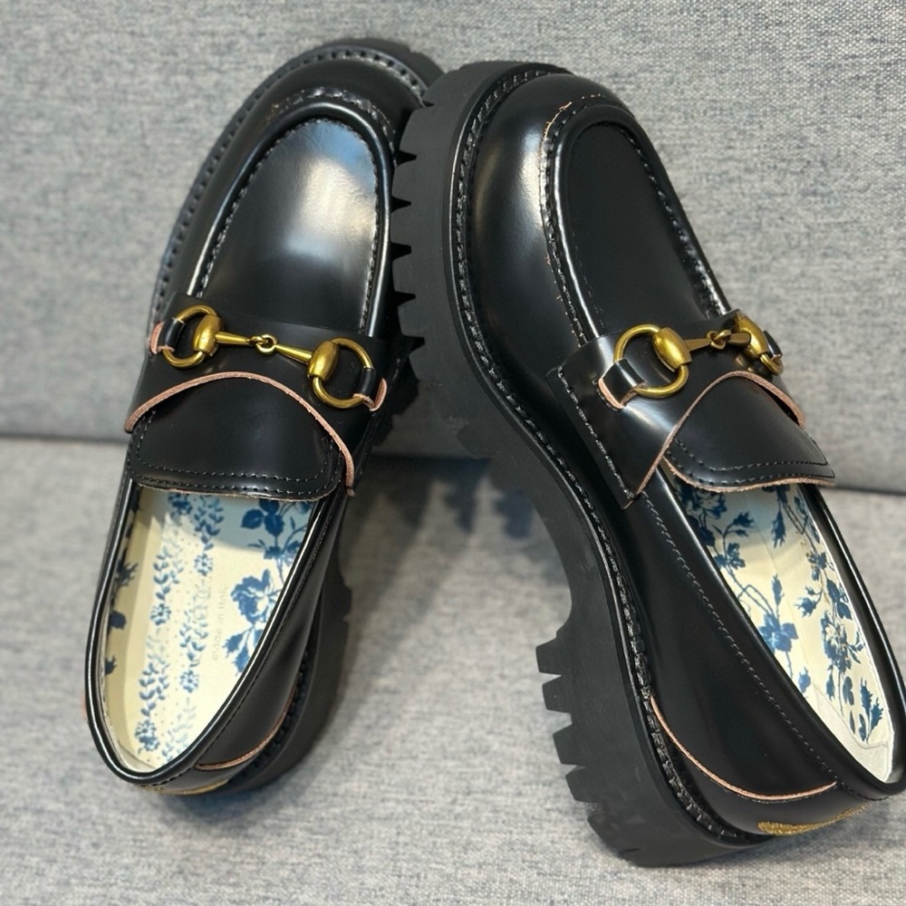 Gucci Black Loafers with Gold Accents